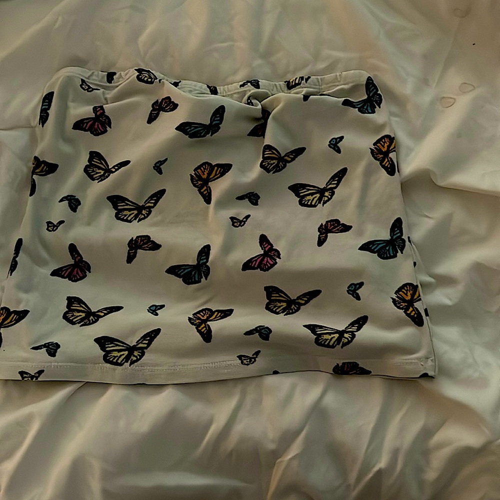 Sleeveless white top with black colorful butterflies. XL in size and from rue21